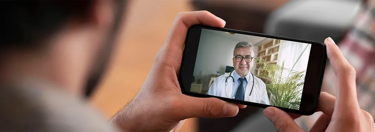 Person viewing care provider on smartphone